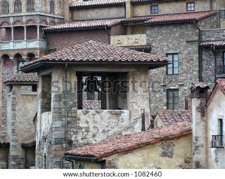 old european roofs and small ring-bell tower