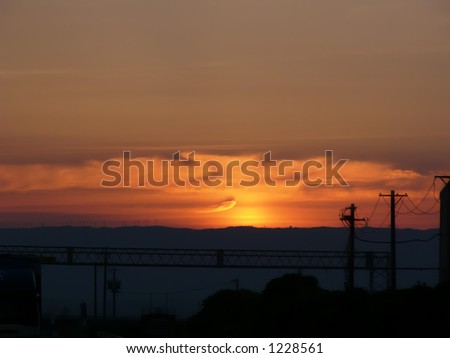 industrial landscape with dramatic sunset clouds, Japan