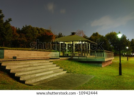 wooden arbor and stairs with scenic night illumination in Japanese Public park, Tokyo Japan