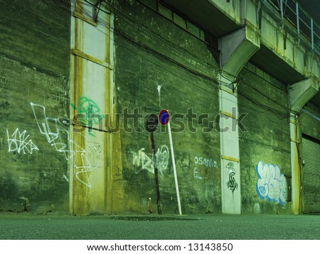 night street background close to dirty scratched wall under railway road structure, Tokyo, Japan