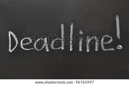 handwritten Deadline with Exclamation point on the school blackboard