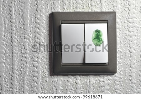 two keys light switch, one is touched by green color fingertip; to switch \