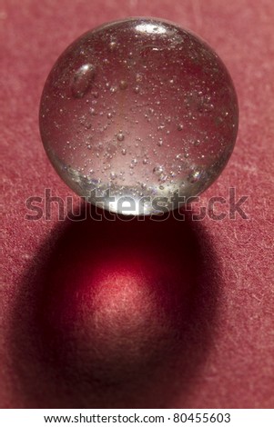 Clear Marble On Red