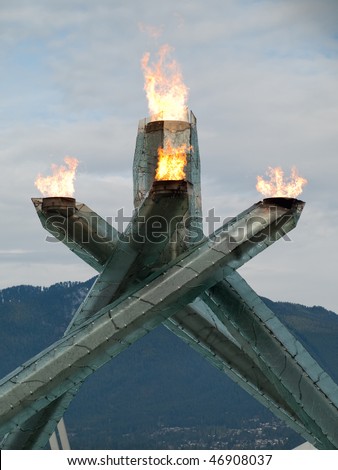 VANCOUVER - FEB 16: The beautiful sculpture holding the Olympic flame illuminates Vancouver Harbour during the Vancouver 2010 Olympic Games on Vancouver British Columbia, Canada, February 16 2010