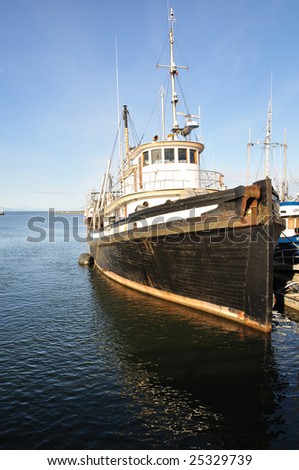 A fish ship in harbor.
