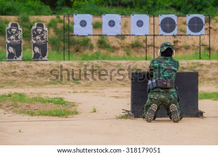 Shooting sports , female athletes ( Military) , during shooting a woman in the race , shooting , Shooting target,  (AARM 2015)
