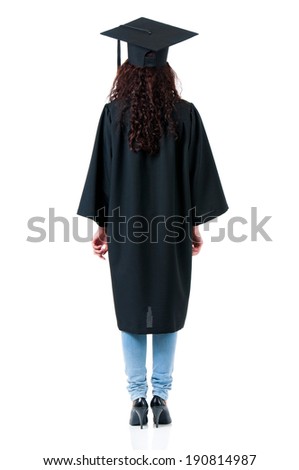 Graduating student girl in an academic gown, isolated on white background