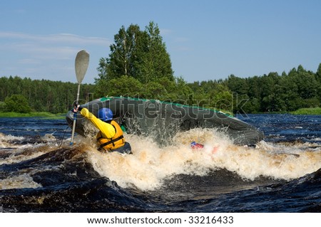 Kayaker sporting a kayak cuts through water