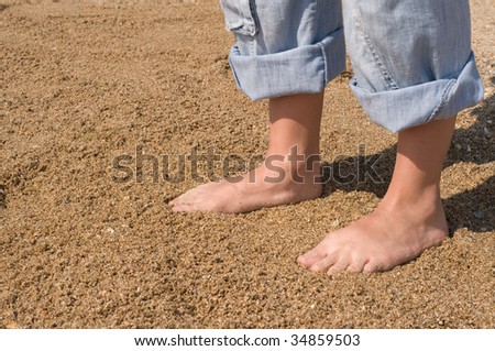 Shot of woman\'s feet taking a break at the beach