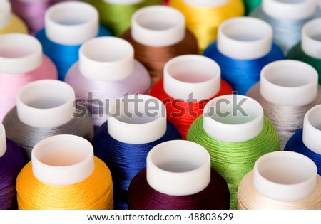 Hanks of multi-coloured threads for embroidery