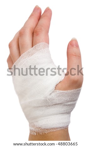 stock photo injured hand of the girl tied up by white bandage