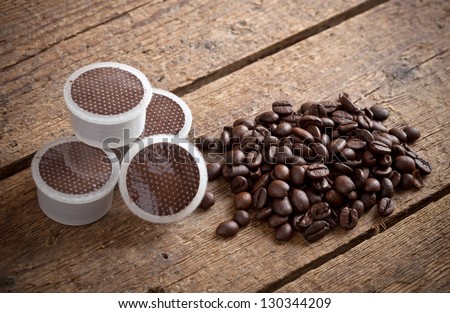Coffee pods on wooden table