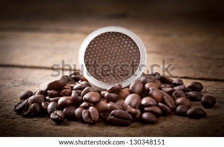 Coffee pods on wooden table