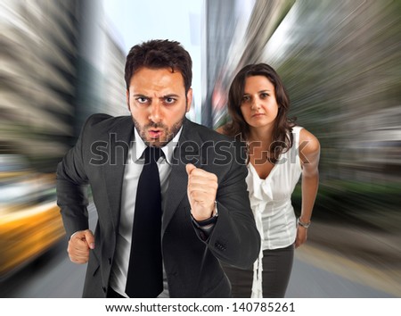 Two people run to work
