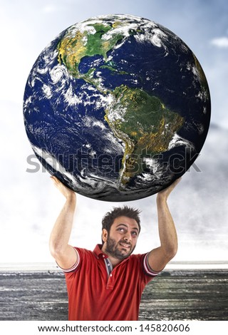 Man sustains the planet on his shoulders - Elements of this image furnished by NASA