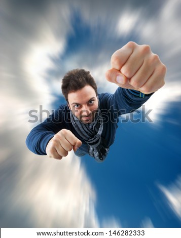 Superhero With Fist Thrust Forward Flying In The Sky