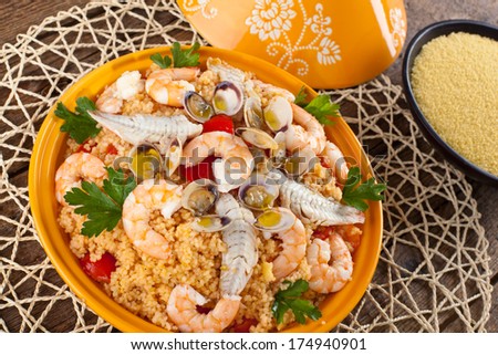 Traditional ethnic food: fish tajine with cous cous