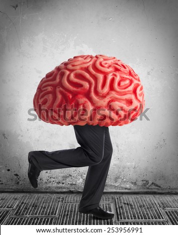 Metaphor of the brain drain. Rubber brain legs while running.