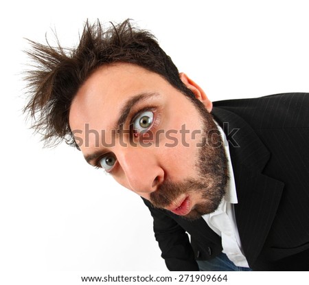 Crazy young businessman facial expression WOW on white background.