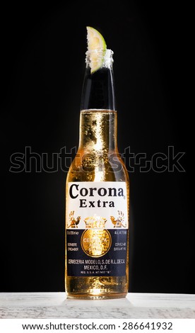 EMPOLI, ITALY - JUNE 12, 2015: Corona Extra beer bottle. Corona Extra is produced by Constellation Brands in Mexico and it is the top selling imported beer brand in the United States.