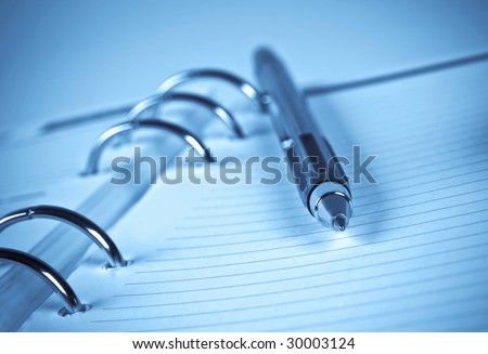 agenda and ball pen