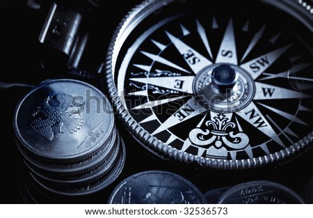 compass and coins