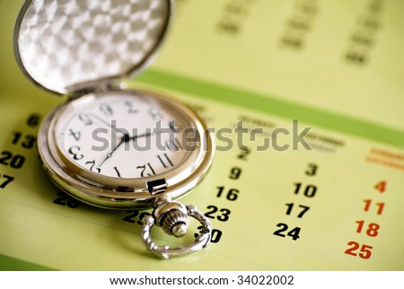 pocket watch and calendar