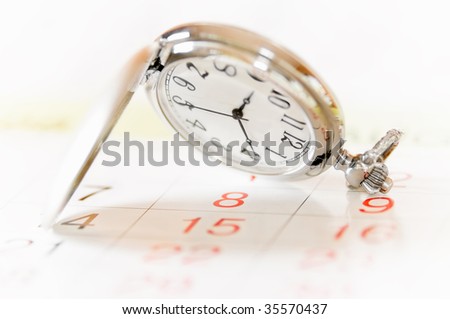 pocket watch and calendar