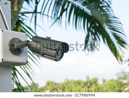 Surveillance camera, CCTV security camera in the park