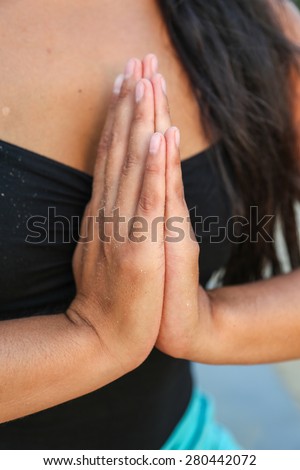 A woman doing yoga. Prayer Position