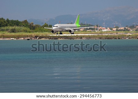 Aircraft landing at a mediterranean island. The airport in Corfu, Greece