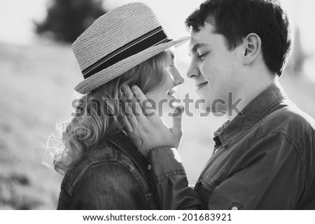 happy young couple on a walk to black and white photo
