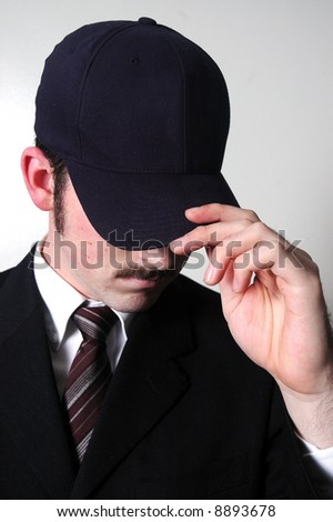 Young Businessman With Baseball Cap. You can put any logo onto cap.