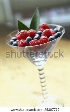 Dessert Fruit Cup with Raspberries, Blueberries, and mint garnish