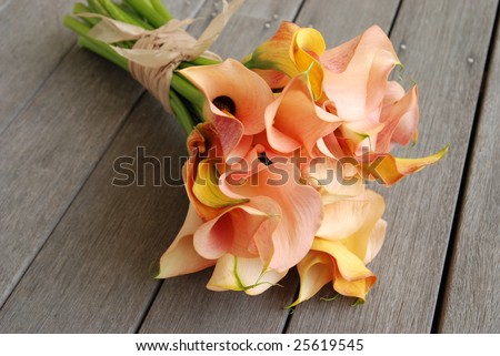 stock photo Calla Lilly Wedding Bouquet on deck
