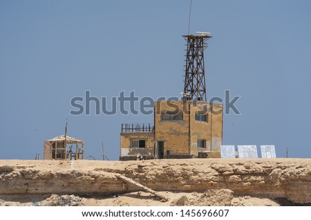Old coastguard building with radar on an offshore Egyptian Island in the Red Sea