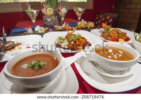 Various selection of chinese meals on table in restaurant