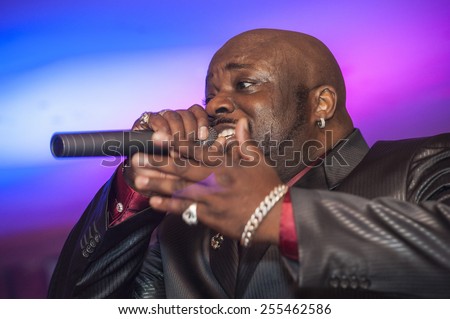 African male singer giving a live soul singing performance
