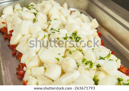 Closeup of boiled potatoes stacked on display at a hotel restaurant buffet