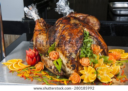 Closeup of roasted turkey on display at a restaurant buffet carvery