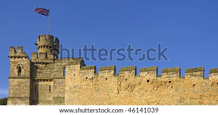 Old english city wall with union jack flag