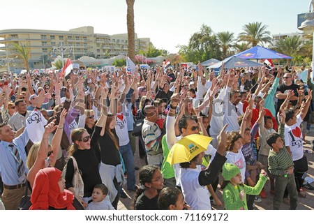 HURGHADA, EGYPT - FEB 14: Street party celebrating departure of President Mubarak and to show world\'s tourists that Hurghada is a safe place on Feb 14, 2011. Egypt underwent over 2 weeks of trouble