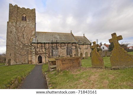 Church and graveyard in an English countryside community