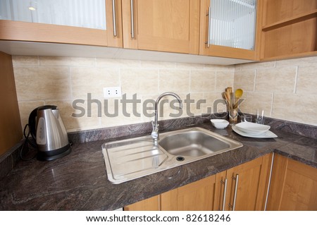 Marble counter top and sink in a modern kitchen