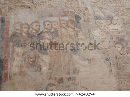 Remains of an ancient roman painting on a temple wall at Luxor in Egypt
