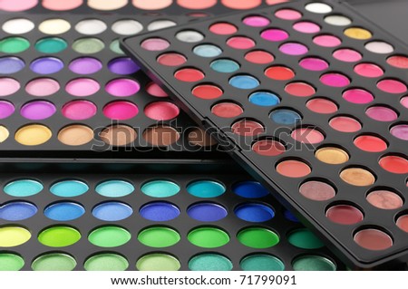 Set of various eye shadows palettes.