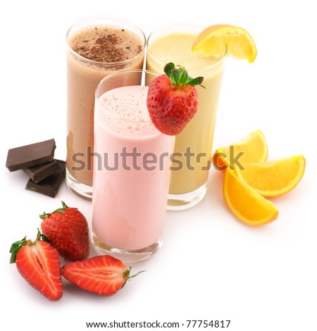 Three assorted protein cocktails with fruits isolated on white background.