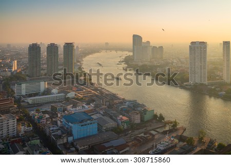 BANGKOK, THAILAND - APRIL 5, 2015: Landscape of Bangkok city in afternoon with bird view. This place is very popular that tourists like to take photos on top view of Chaopraya river.