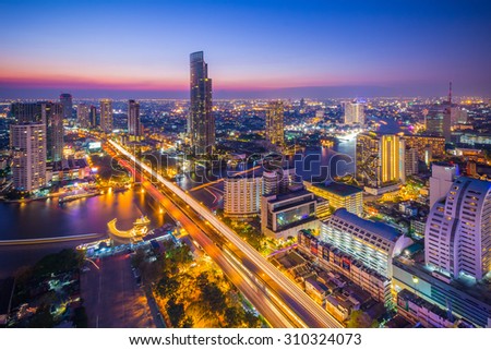 BANGKOK, THAILAND - APRIL 5, 2015: Landscape of Bangkok city in twilight time with bird view. This place is very popular that tourists like to take photos on top view of Bangkok.