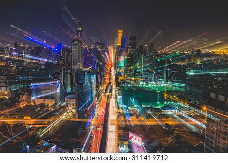 BANGKOK, THAILAND - APRIL 5, 2015: Landscape of Bangkok city in night time with bird view. This place is very popular that tourists like to take photos on top view of Bangkok.